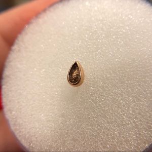 Pear cut rutilated quartz in 14k rose gold end